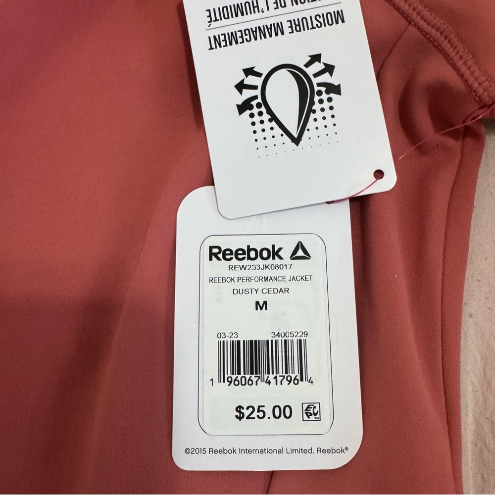 Reebok Women's Elevated Performance Jacket with Zipper Pocket Medium Dusty Cedar - Picture 6 of 7